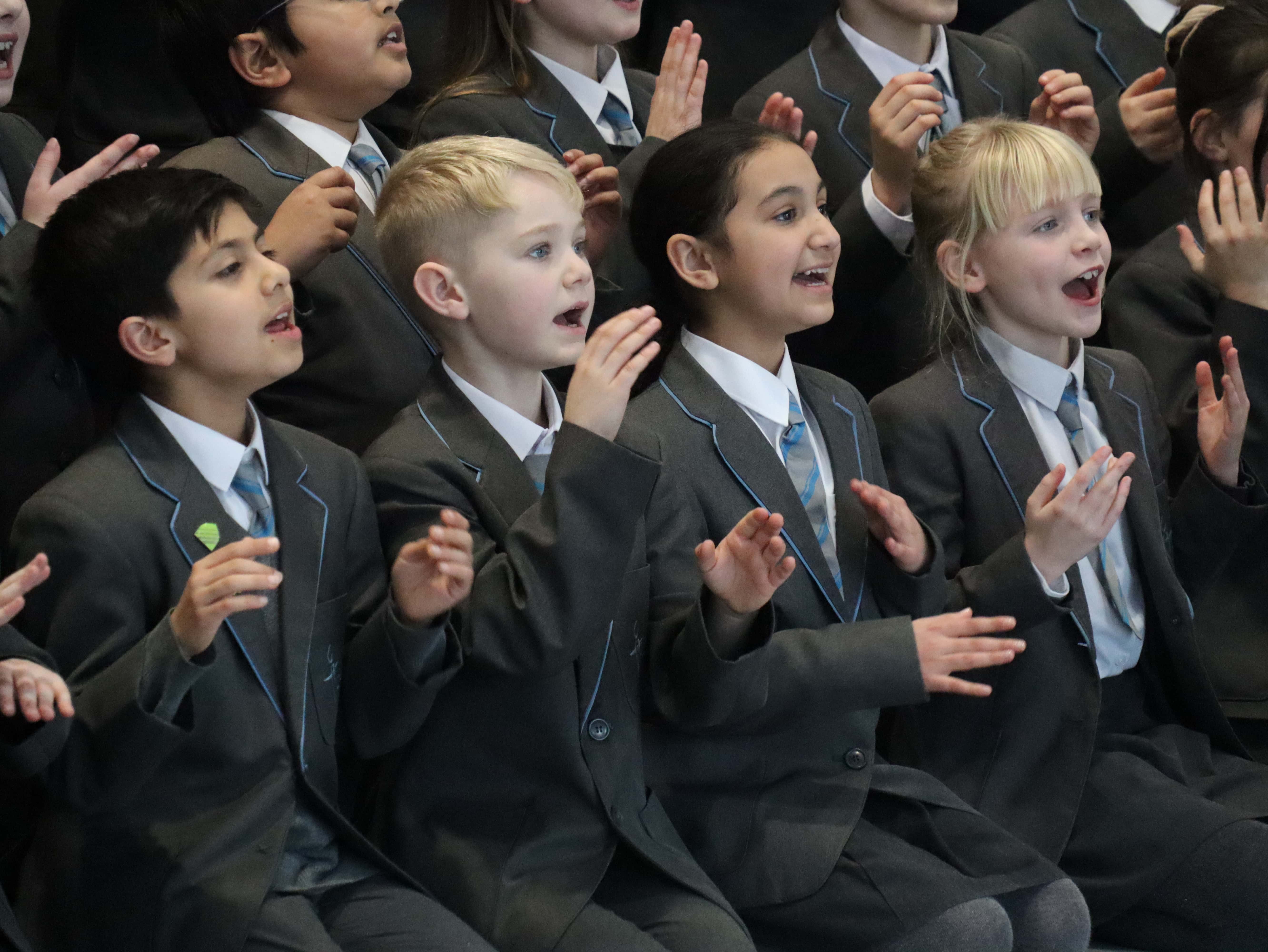 Pupils from Cheadle Hulme Primary School perform.