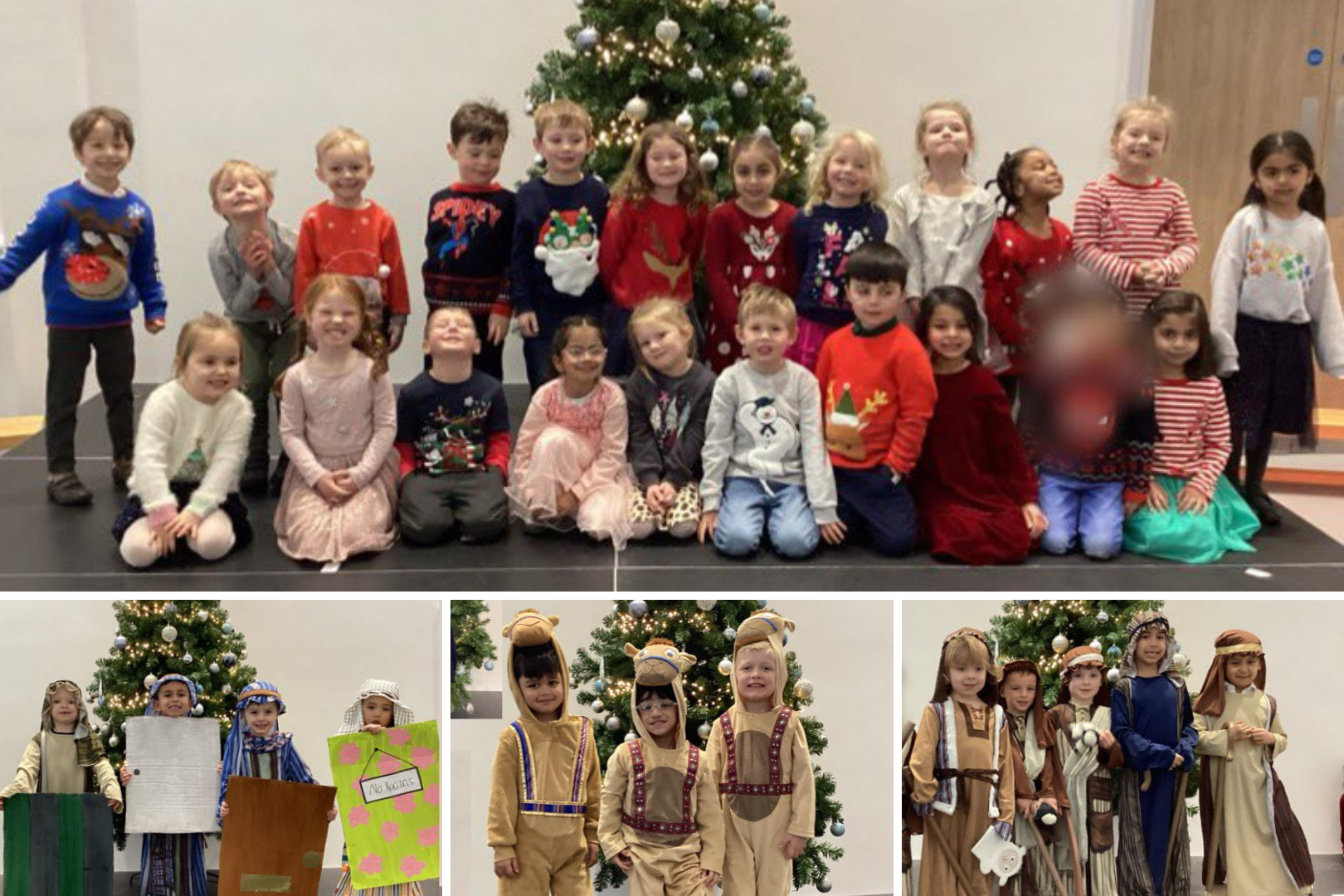 Children pose in front of the Christmas tree in their nativity costumes and Christmas jumpers