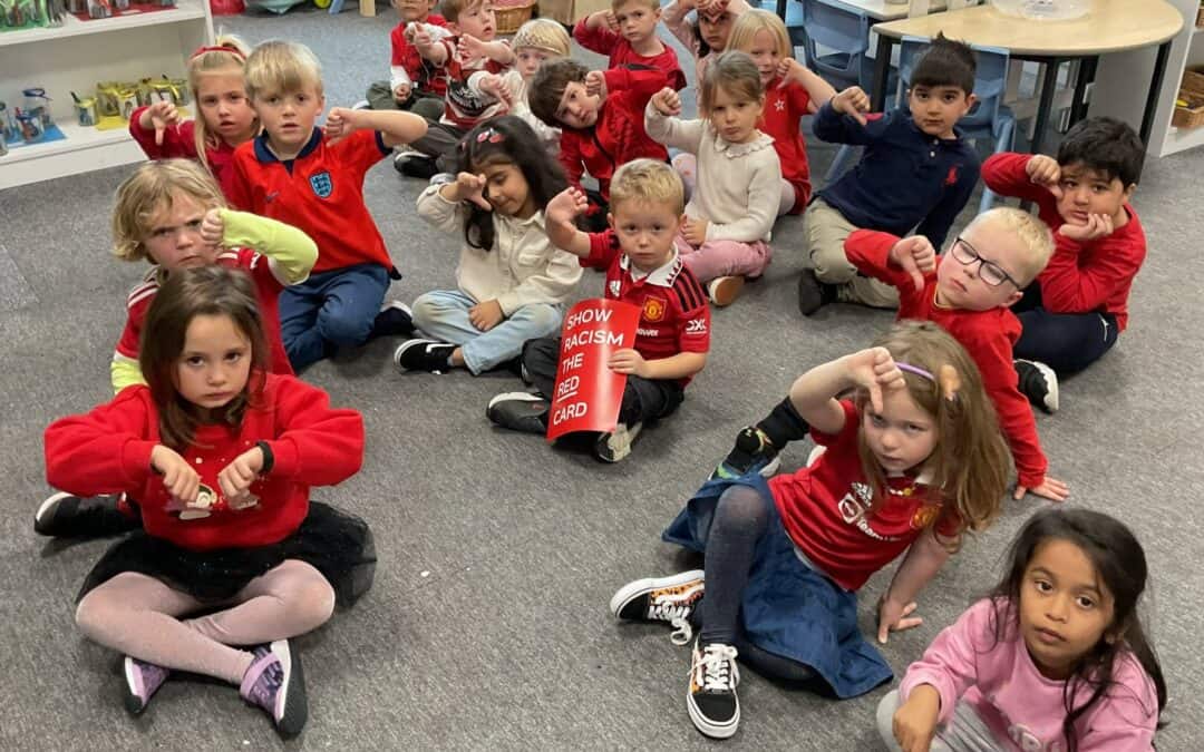 Cheadle Hulme Primary School pupils wearing red for show racism the red card day