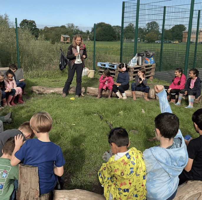 Cheadle Hulme Primary Students engaging in Forest School activities.