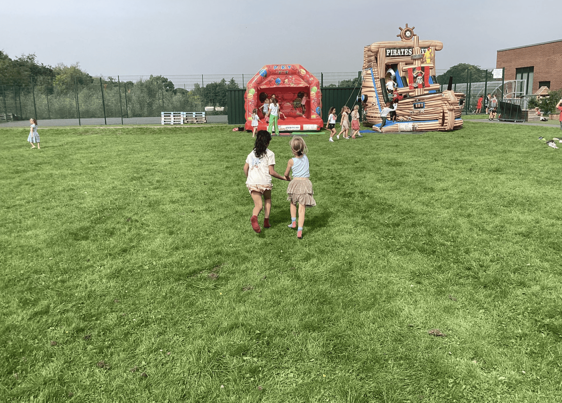 Pupils are playing on the inflatables